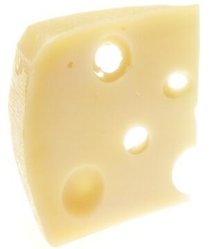 A yellow colored slice of Emmental Swiss cheese